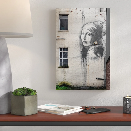 The Girl with the Pierced Eardrum by Banksy - Wrapped Canvas Graphic Art Print