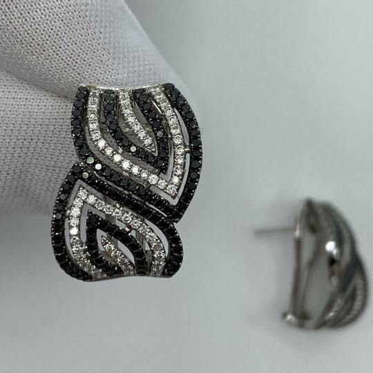 Modern Stylish Black & White Diamond 18 Karat Gold Swirl Stud Earrings