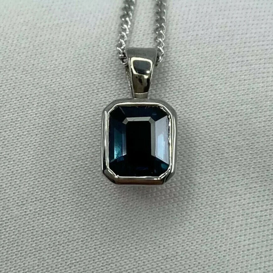 1.14Ct Emerald Cut Untreated Deep Blue Sapphire Rubover 18K White Gold Pendant
