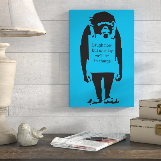 Laugh Now on Blue by Banksy - Wrapped Canvas Graphic Art Print