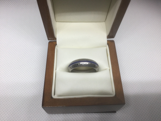 Damascus Steel Ring With An Inlay Of Lapis Lazuli