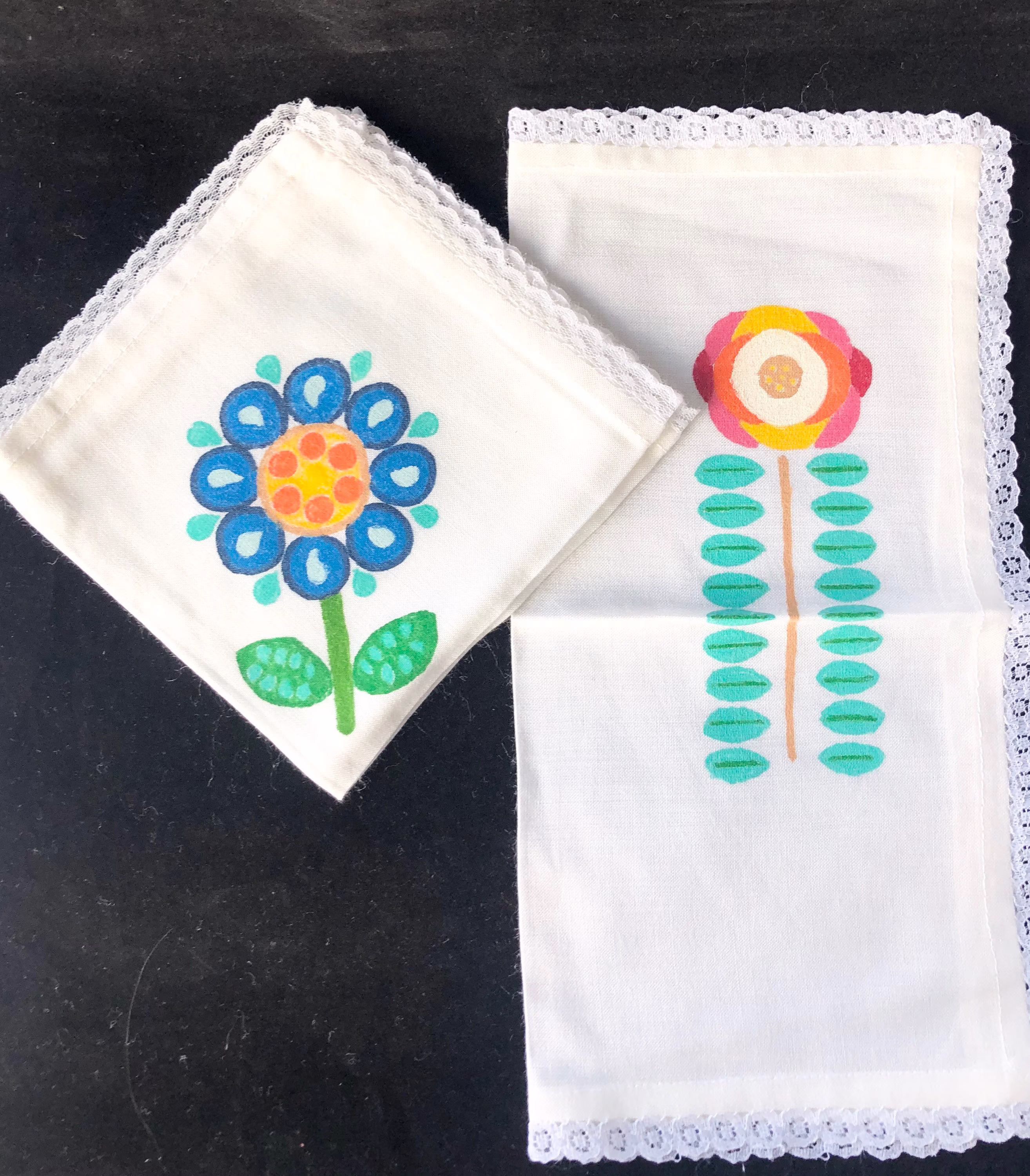A Pair Of Vintage Handmade Handkerchiefs. Decorated With Iconic Designs From The 1970S Using Hobbytex Crafting